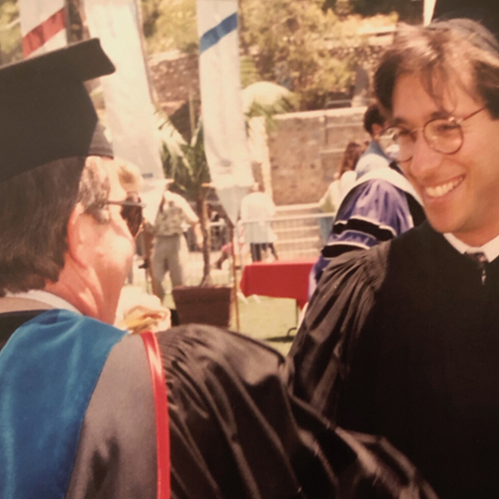 Glen Broom congratulates Scott Pansky at his graduation.